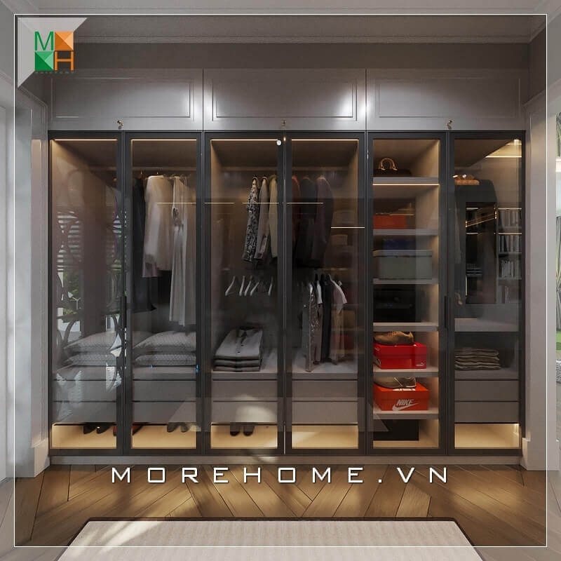 Hiện đại và sang trọng là nét nổi bật của thiết kế tủ quần áo kết hợp kính và gỗ thuận tiện cho việc lựa chọn đồ đạc.